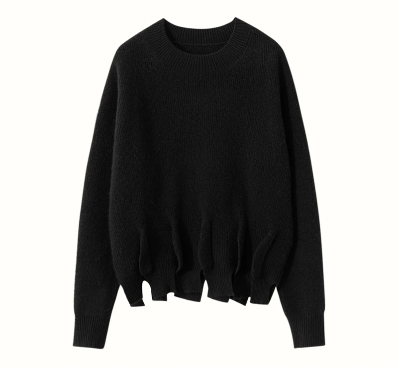 Women’s cashmere sweater in Onyx, with staggered seam construction and sculptural flounces — From Borcelleclothes.