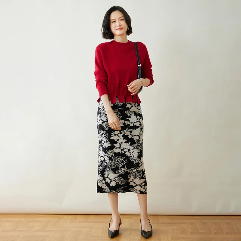 Model in Red Devil cashmere sweater paired with black-and-white floral skirt – From Borcelleclothes.