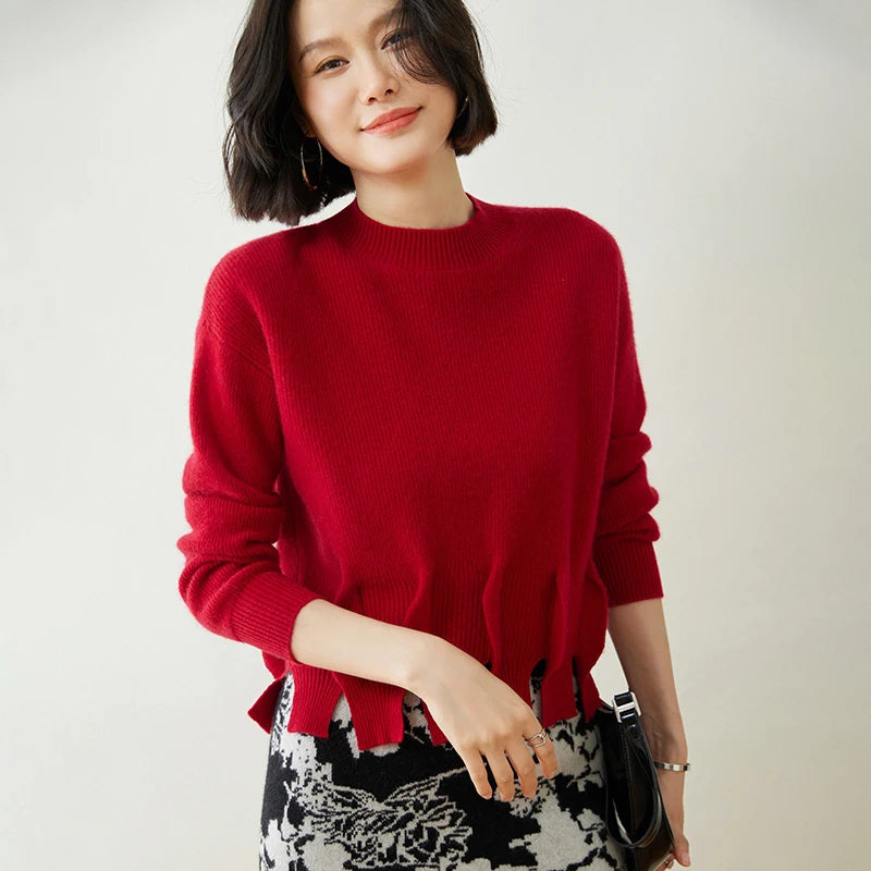 Women’s cashmere sweater in Red Devil, with staggered seam construction and sculptural flounces — From Borcelleclothes.