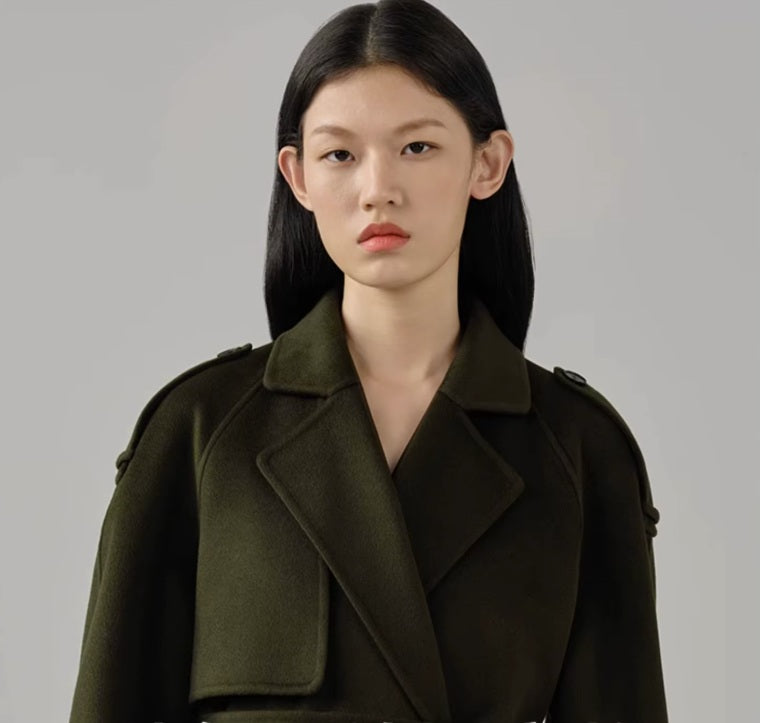 The upper part of the women's cashmere trench coat in Birch, featuring the shoulder tabs and single storm flap. From Borcelleclothes.
