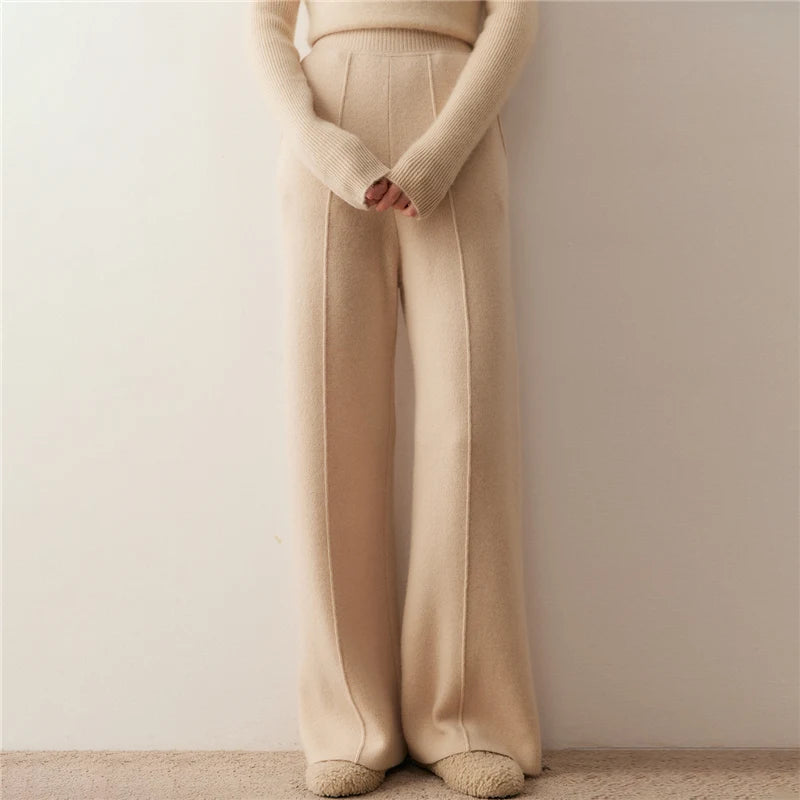 Women's Cashmere trousers in Desert Sand, with tuck detail, hidden side pockets, and a ribbed waistband — From Borcelleclothes.