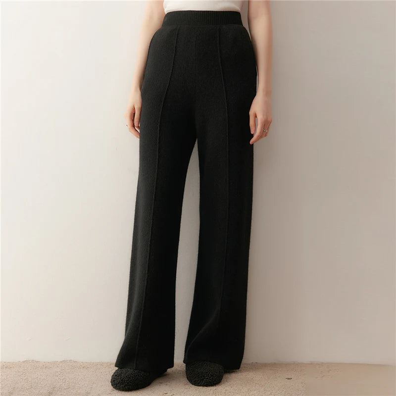 Women's Cashmere trousers in Onyx, with tuck detail, hidden side pockets, and a ribbed waistband — From Borcelleclothes.