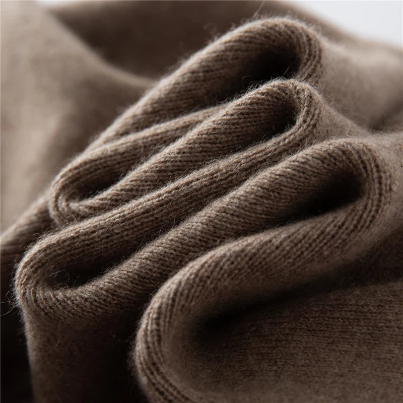 Wave-folded texture of pastel brown cashmere trousers with tuck detail — From Borcelleclothes.