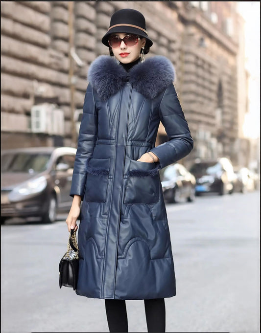 Model in Paris Skies sheepskin coat with one hand in curved fox-trimmed pocket — From Borcelleclothes.