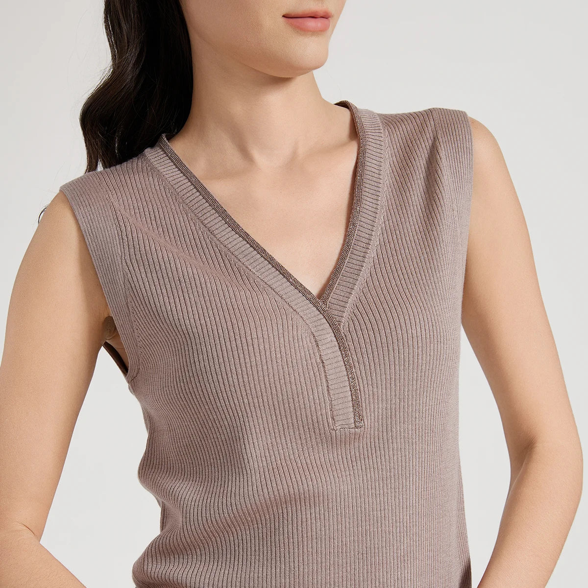 Close-up of Martini ribbed top highlighting curved V-neckline, rhinestone fringe, and rib texture. From Borcelleclothes.