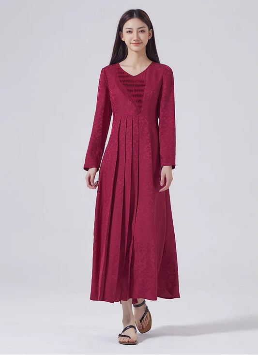 Model stepping forward in Dark Raspberry Jacquard Silk Dress. From Borcelleclothes.