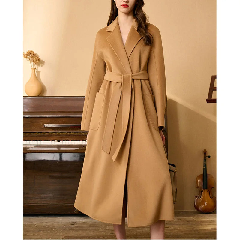 Women's Double-sided cashmere wrap coat in Whiskey with notched lapels and patch pockets, secured with a matching belt. From Borcelleclothes.