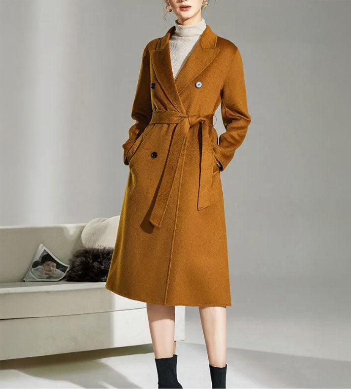 Women's Double-Sided Wool-Cashmere Coat in Bourbon, showcasing luxurious peaked lapels, a straight silhouette, and meticulously tailored details like single-welt pockets with buttonholes, crafted from a premium wool-cashmere blend for warmth and refinement. From Borcelleclothes.