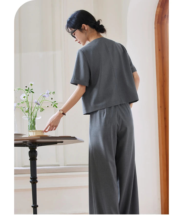 Back view of the model wearing the Fiord two-piece set. From Borcelleclothes.