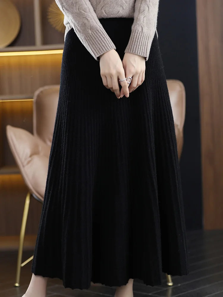 Women's flaring lines merino skirt with sculpted silhouette and fluted hem, shown in Onyx— From Borcelleclothes.