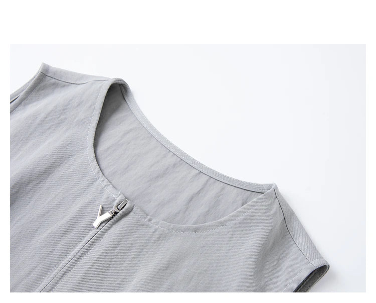Detail of the round neckline on the sleeveless French Grey jacket. From Borcelleclothes.