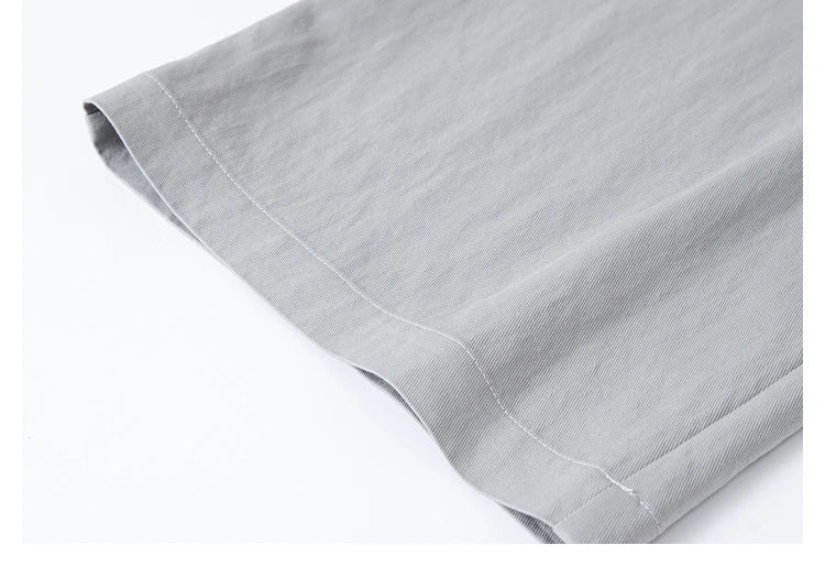 Bottom hem of the trousers in French Grey, showing neat finishing. From Borcelleclothes.