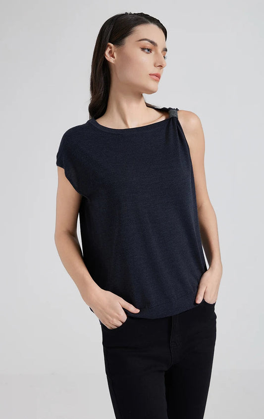 Model in Black Pearl top with both hands in pockets, emphasizing balance between softness and structure. From Borcelleclothes.