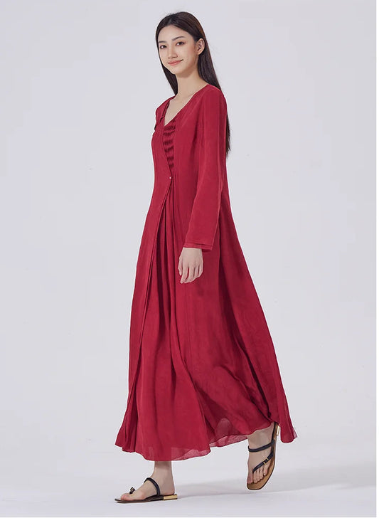 Side view while walking, showcasing the fluidity of the layered silk panels and calf-length hem. From Borcelleclothes.