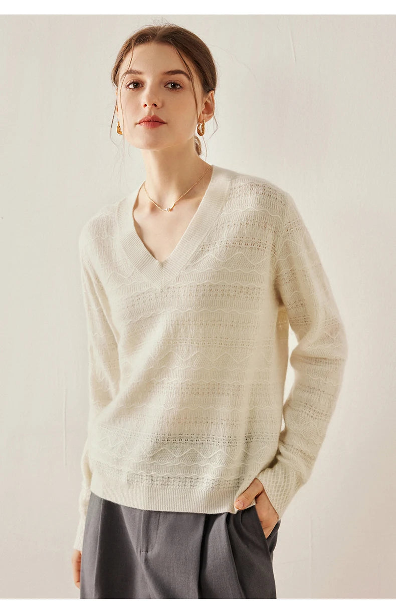 Himalayan cashmere sweater in Pearl Bush with model’s hand in pants pocket — From Borcelleclothes.