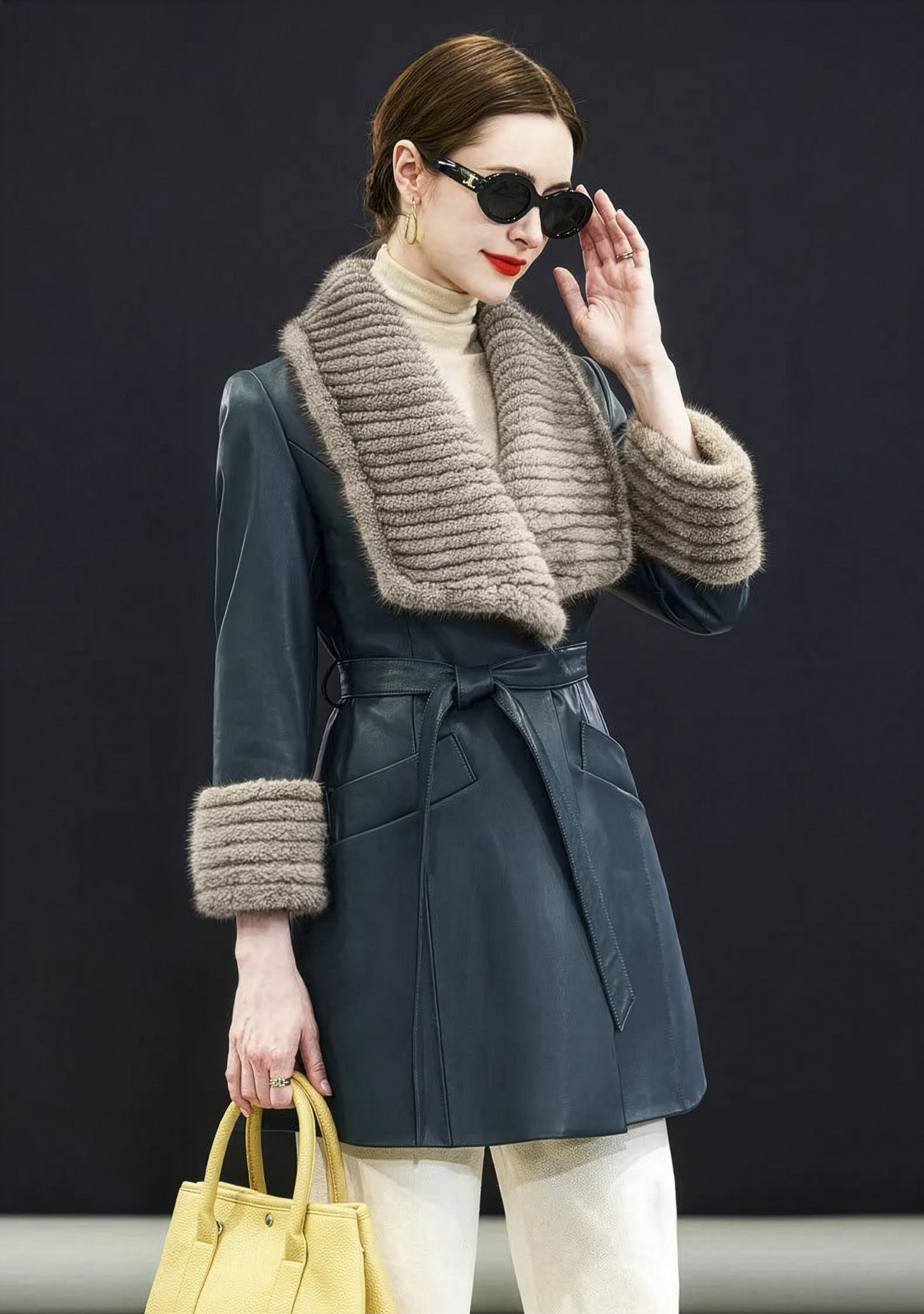 Model adjusting sunglasses while wearing sheepskin coat in Independence with rectangular mink collar. — From Borcelleclothes.