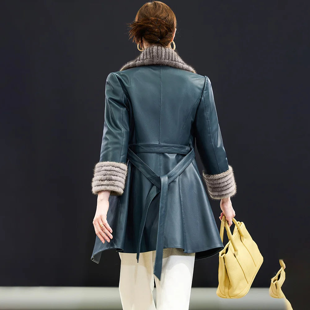 Back view of sheepskin coat in Independence with flared hem and defined waistline. — From Borcelleclothes.