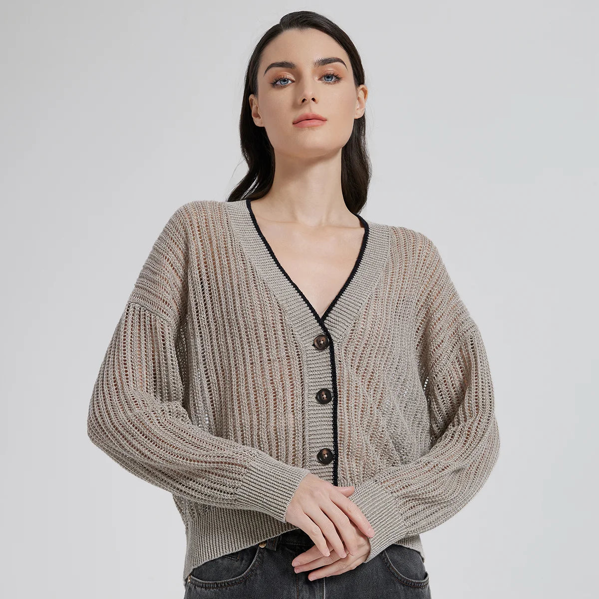 Women's Linen cardigan in Tide with vertical lace knit, dropped shoulders, contrast buttons, and ribbed trim—lightweight, structured, and refined. From Borcelleclothes.