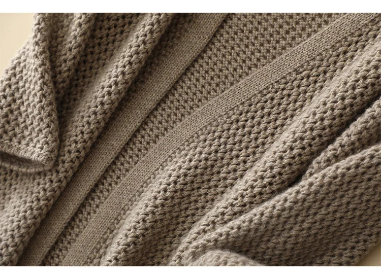 Mid-section detail of Beigewood cardigan with firm placket line — From Borcelleclothes.