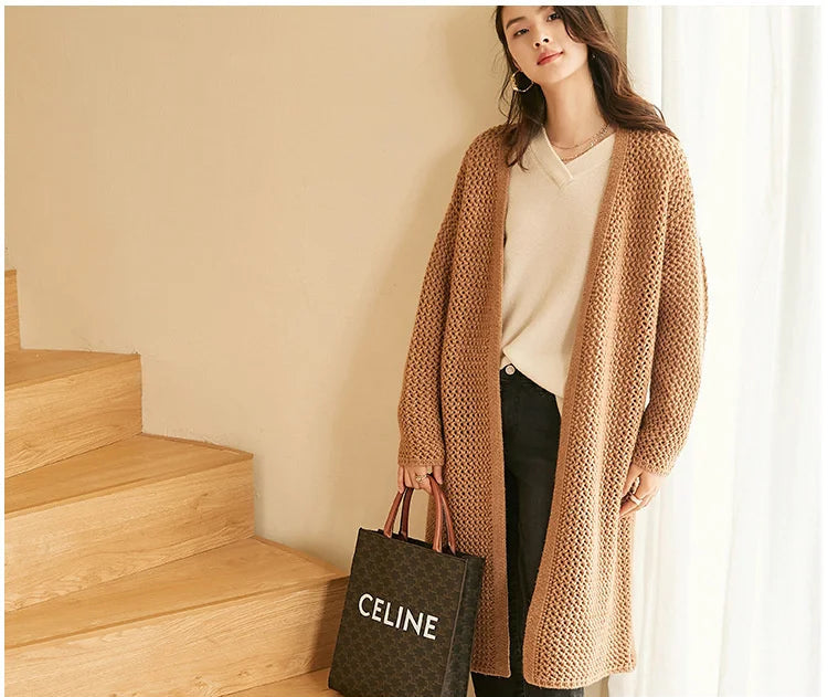 Model wearing the Fox-color mesh cardigan, standing near stairs — From Borcelleclothes.