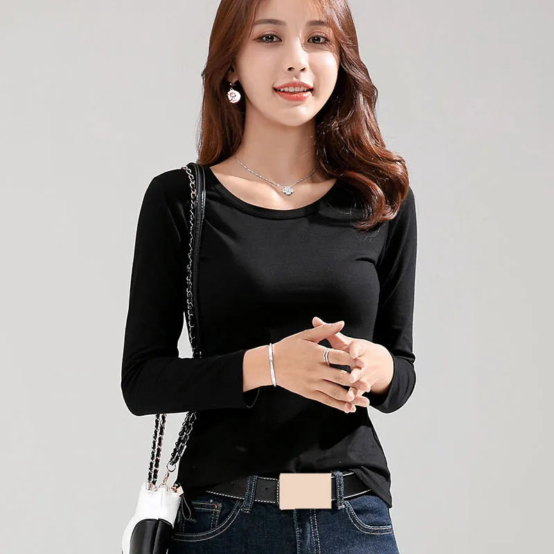 Women's Long-Sleeve Scoop Neck T-Shirt in Black, featuring a soft and stretchy cotton blend for a comfortable, figure-enhancing fit. This versatile top offers a casual yet elegant look with its graceful scoop neck and solid pattern, perfect for layering or wearing on its own. From Borcelleclothes.