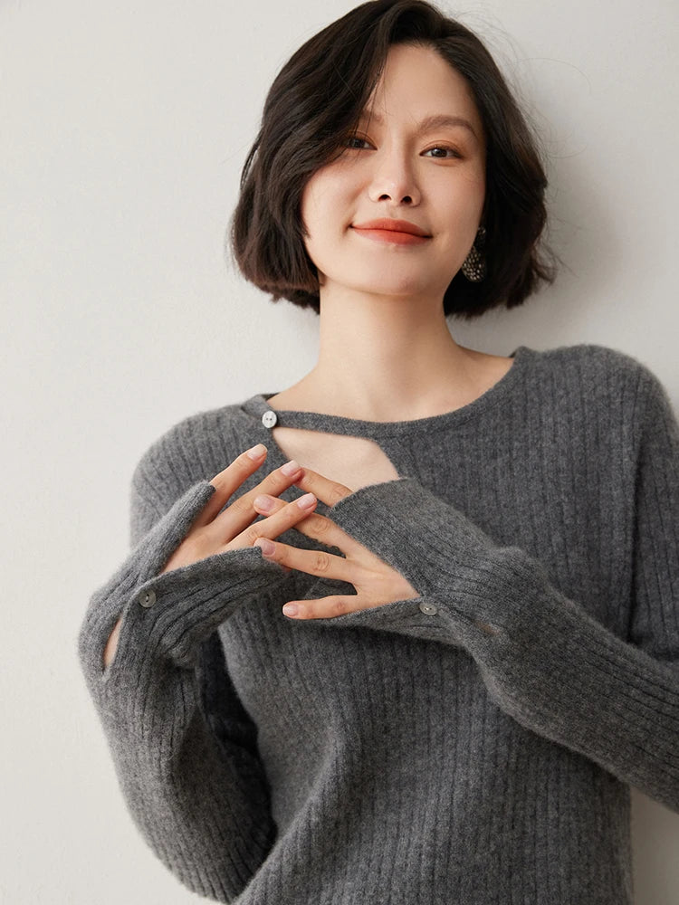 Loop neckline cashmere sweater in Davy Grey with model’s fingers gently crossed — From Borcelleclothes.