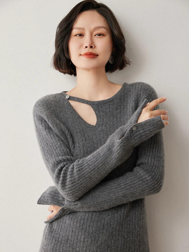 Loop neckline cashmere sweater in Davy Grey with model’s arms gently folded across — From Borcelleclothes.
