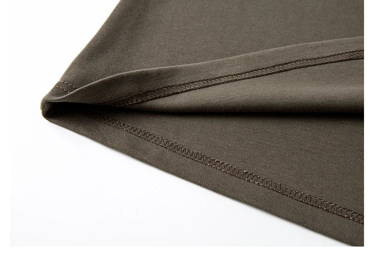 Unfolded bottom of the dress, revealing the fluid drape of the cotton-blend knit. From Borcelleclothes.