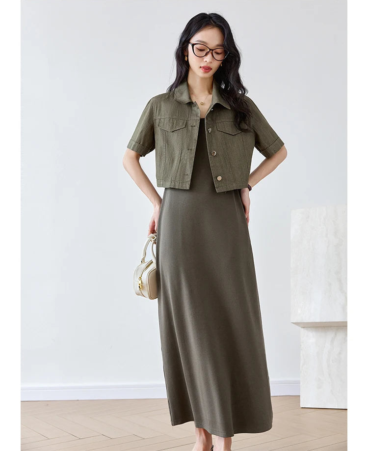 Model wearing the Makara set with hands on hips, highlighting the contrast between fitted jacket and flowing dress. From Borcelleclothes.