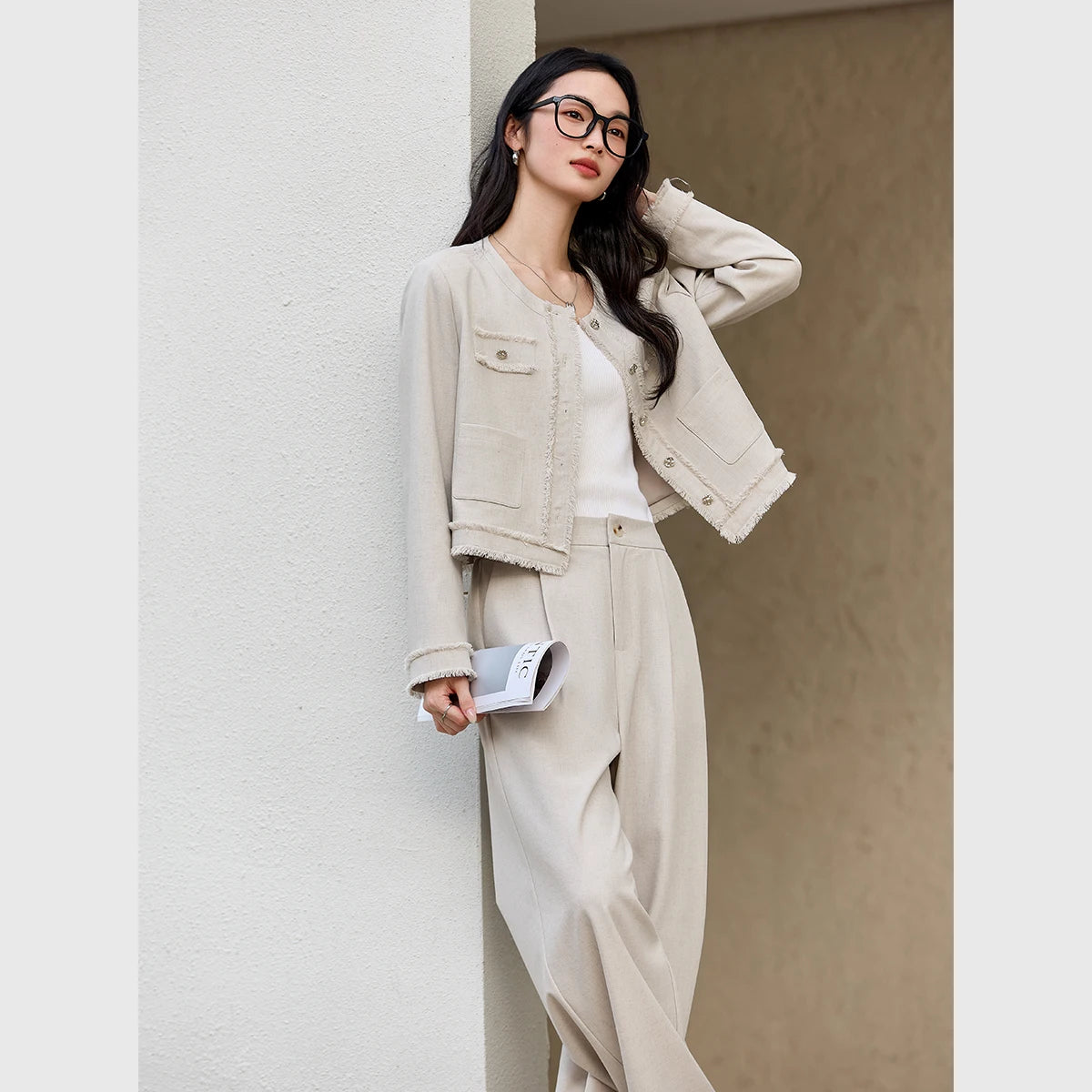 Women's two-piece set in Martini color with silver buttons and thread-fringed details on the jacket and wide-leg trousers. From Borcelleclothes.
