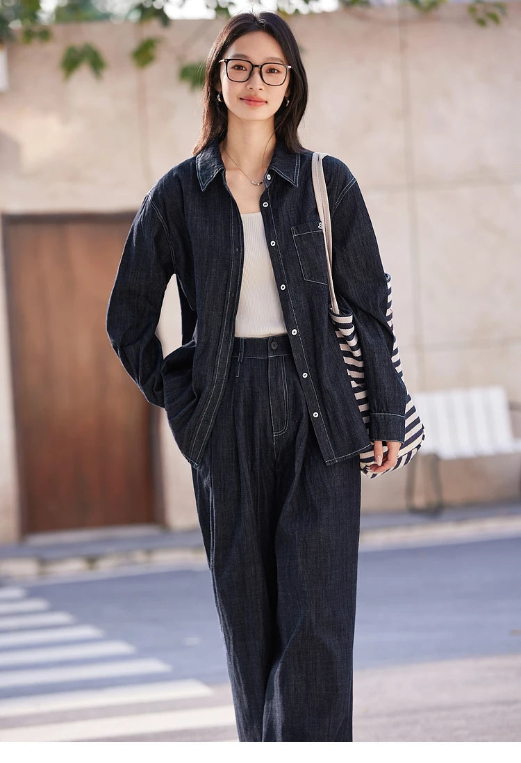 Model wearing the Midnight Express set with a shoulder bag — relaxed cotton layers in deep urban tone. From Borcelleclothes.