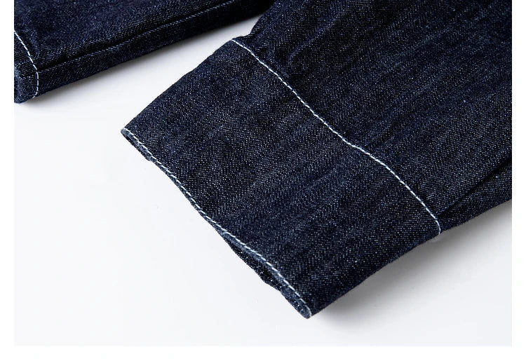 Close-up of single-button cuff with topstitching — tailored finish with soft structure. From Borcelleclothes.