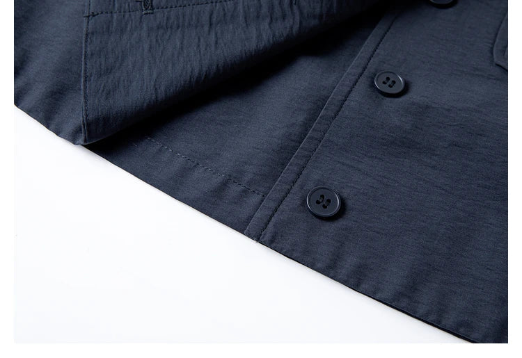 Lower hem of the vest shown unfolded — highlighting clean finish and architectural cut of the Mirage jacket. From Borcelleclothes.