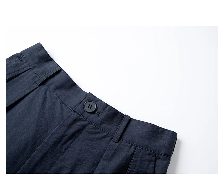 Detailed view of trousers waistband with belt loops. From Borcelleclothes.