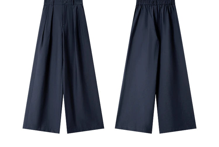 Front and back view of straight-leg trousers — pleated front and clean back with elastic detail for movement. From Borcelleclothes.