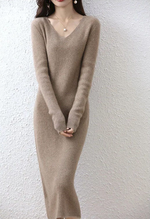 Women's Modern Wool Dress in Almond Frost featuring a slim-fit design, 2x2 ribbed texture, and a V-neckline. The long sleeves extend to the fingers for a cozy and elegant look, showcasing the luxurious wool fabric and mid-calf length silhouette, Borcelleclothes.