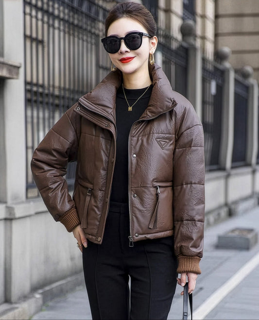 Women's sheepskin puffer jacket in Rose Ebony with a tall stand collar, hidden zip placket, and dropped shoulders — From Borcelleclothes.