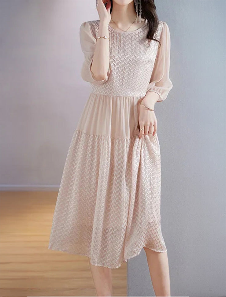 Mulberry silk georgette dress in Clam Shell, featuring embossed geometric texture with contrasting matte and sheen surfaces that shift with light. From Borcelleclothes.