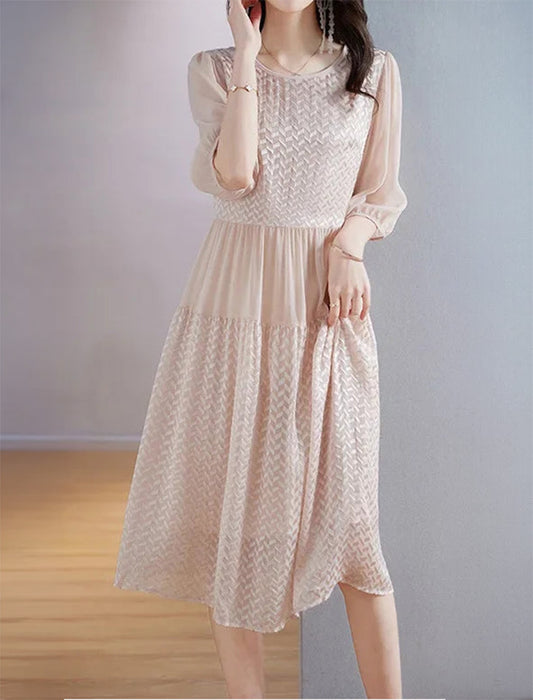 Mulberry silk georgette dress in Clam Shell, featuring embossed geometric texture with contrasting matte and sheen surfaces that shift with light. From Borcelleclothes.