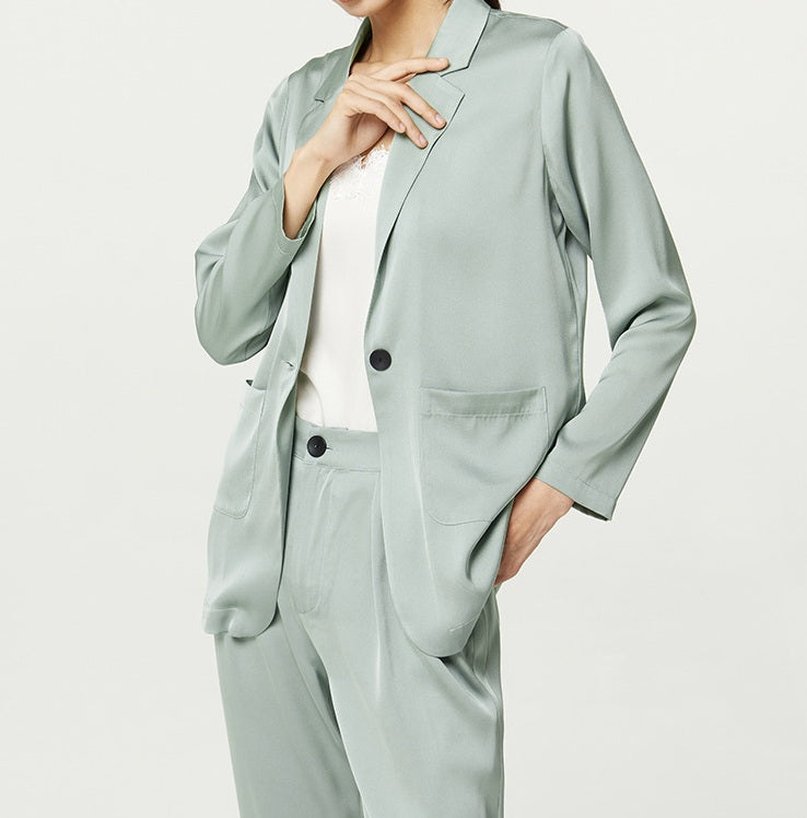 Blazer section of the Mulberry silk satin set in Nebula — pale sage tone and relaxed tailoring offering lightness and clarity. From Borcelleclothes.