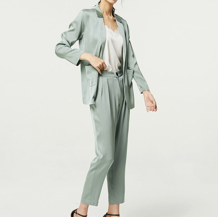 Model in Nebula silk satin set, turned slightly to the side — fluid shape and breathable fabric creating quiet rhythm. From Borcelleclothes.