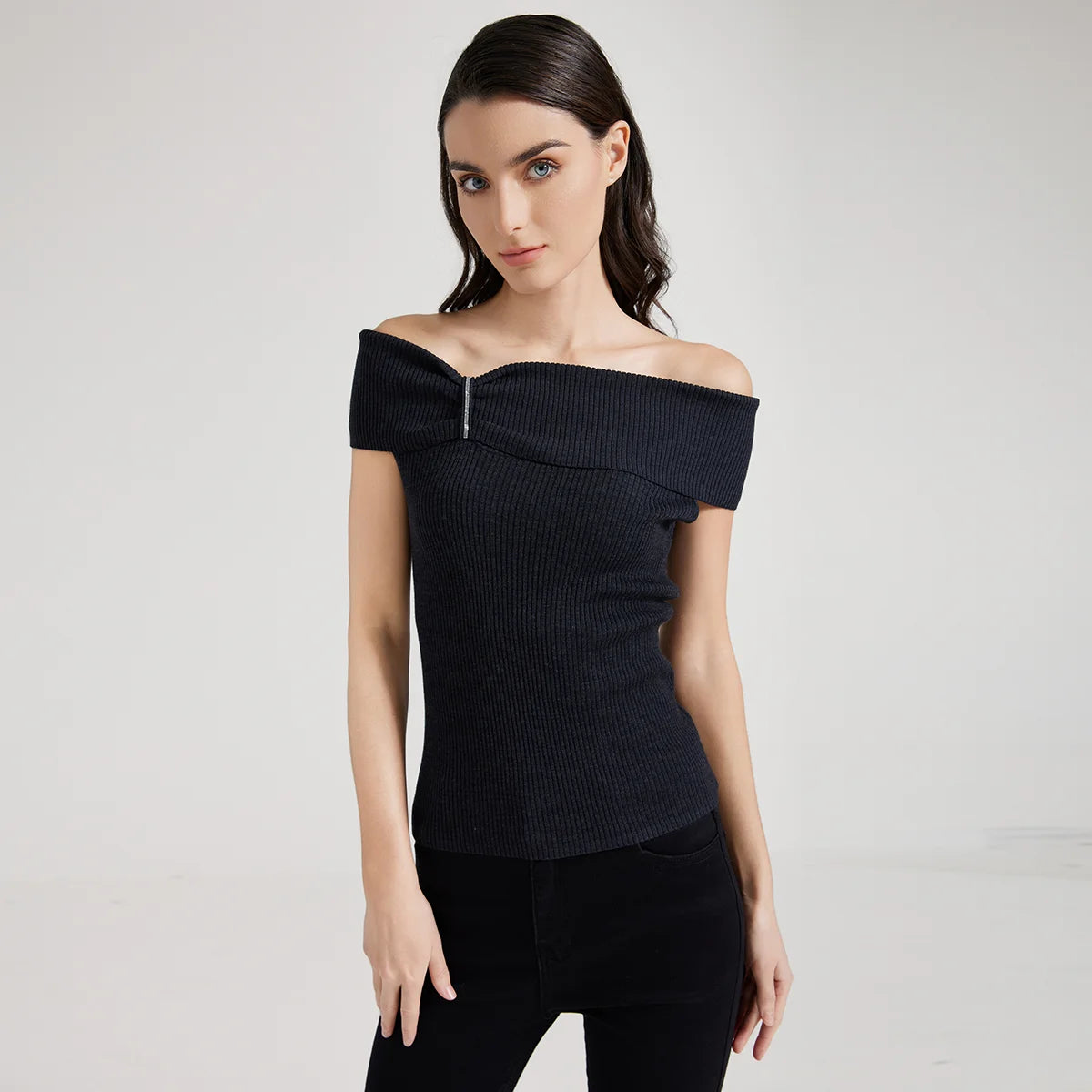 Off-the-shoulder women’s top in Black Pearl color made from fine ribbed wool and silk, featuring a gathered overlay with rhinestone fringe above the bust. From Borcelleclothes.