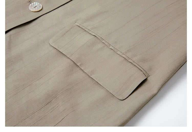 Close-up of the jacket’s side flap pocket, crafted in Olive Haze crinkled fabric. From Borcelleclothes.