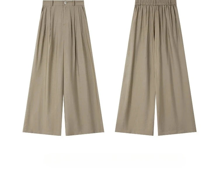 Front and back view of the trousers in the Olive Haze two-piece set, with soft drape and straight leg cut. From Borcelleclothes.