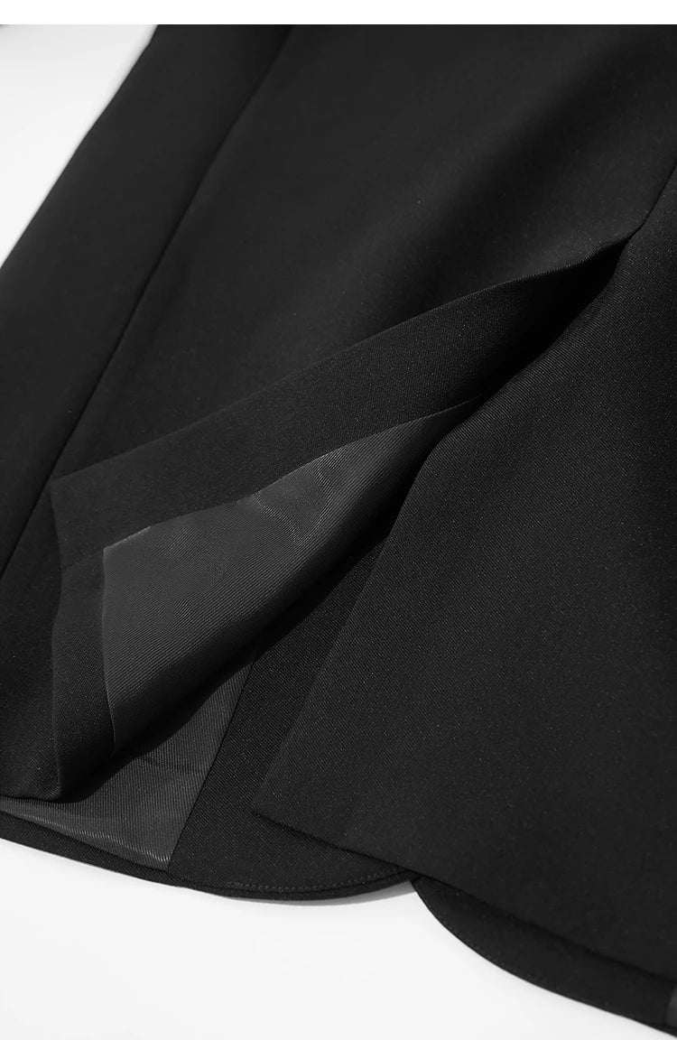 Back vent detail of Onyx minimal blazer, unfolded clean finish – From Borcelleclothes.
