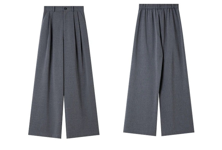 Front and back views of the trousers from the Payne’s Grey two-piece set, showing pleats, waistband, and straight-leg cut. From Borcelleclothes.