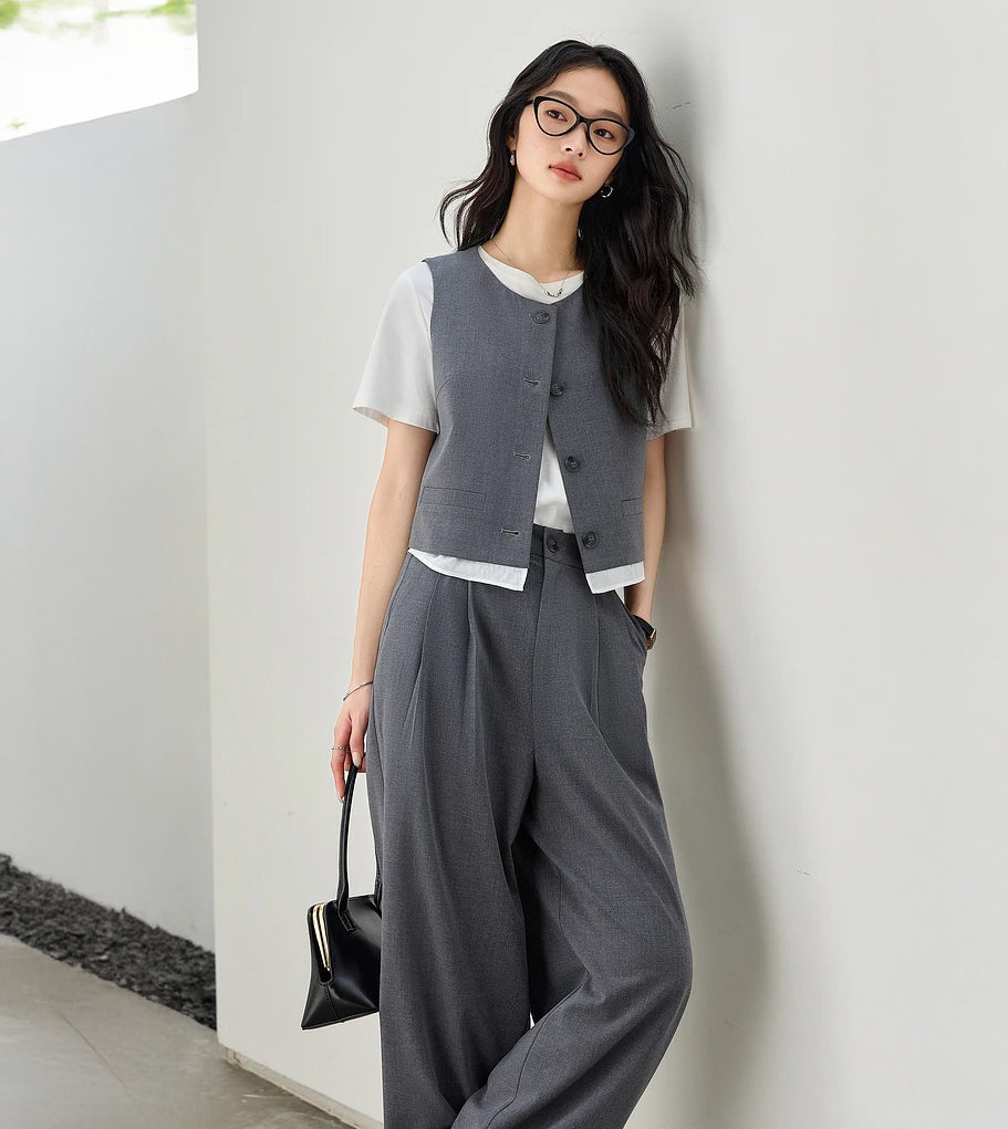 Women’s two-piece set in Payne’s Grey, featuring soft structure, minimalist tailoring, and quiet presence inspired by a painter’s refusal to use harsh black. From Borcelleclothes.