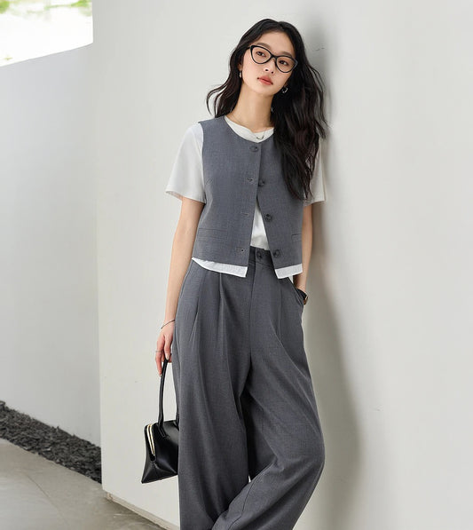 Women’s two-piece set in Payne’s Grey, featuring soft structure, minimalist tailoring, and quiet presence inspired by a painter’s refusal to use harsh black. From Borcelleclothes.