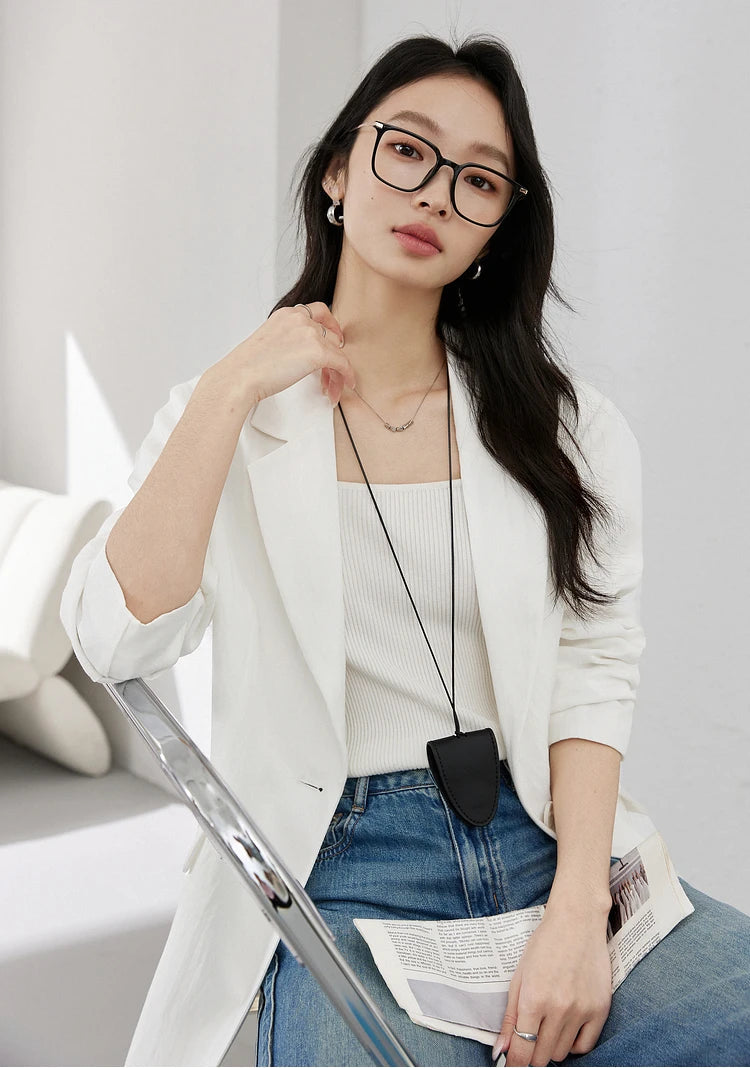 Women’s Platinum & Onyx Urban Blazer in Platinum, with thigh-length cut, notch lapels, and single button design, crafted for composed and unhurried elegance. From Borcelleclothes.