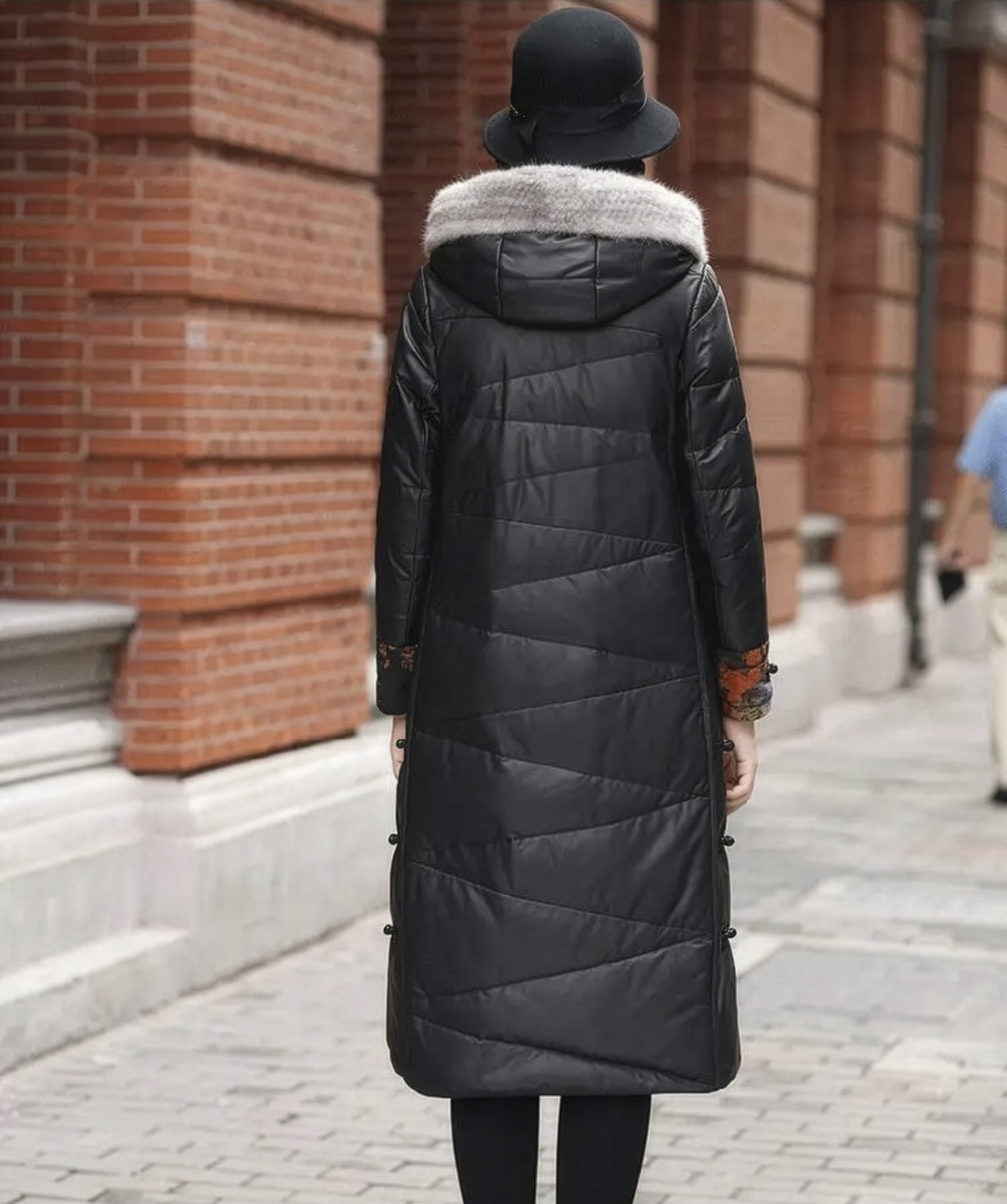 Back view of the Onyx sheepskin coat showing tonal zigzag quilting and A-line silhouette— From Borcelleclothes.